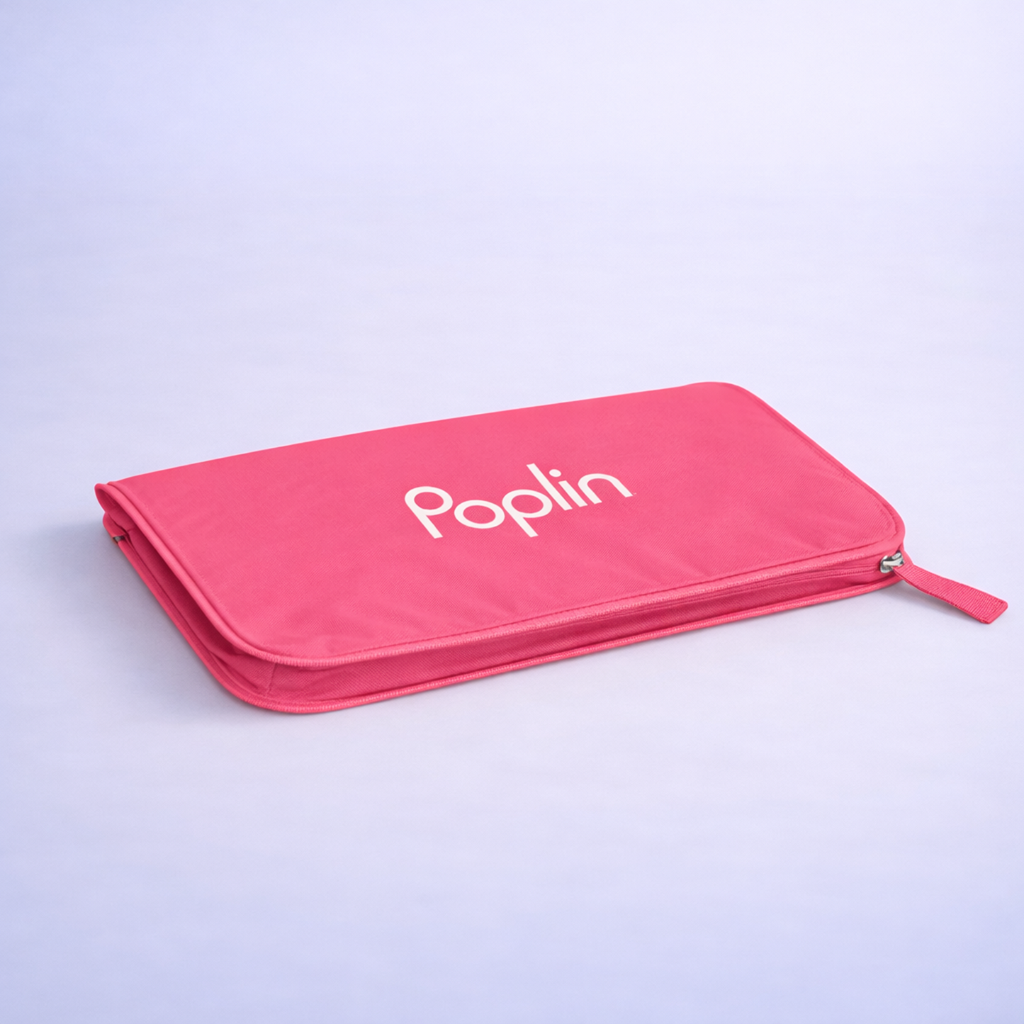 Pink Poplin delivery bag folded flat into a compact, portfolio-style shape on a studio background.
