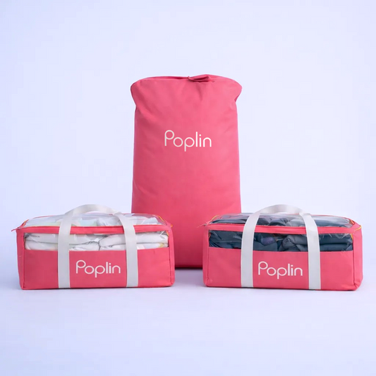 Poplin laundry bundle showing one dual-purpose pickup bag and two delivery bags arranged together on a clean studio background.